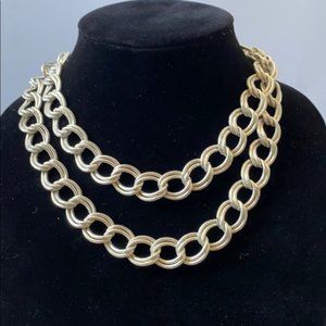 Double tier silver colored career chain